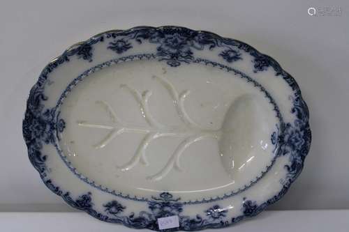 A large flow blue Victorian meat plate. Sold as seen 52x38cm