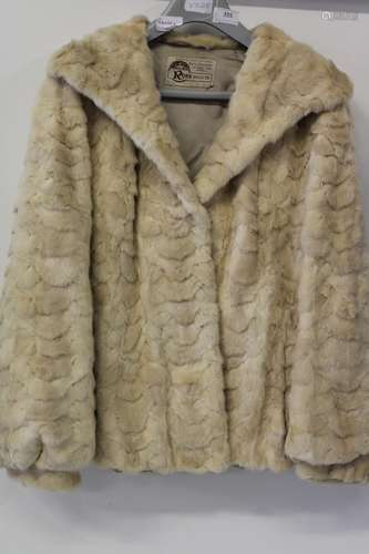 A vintage Ladies Fur coat by Ross of Leeds (probably Ermine)...