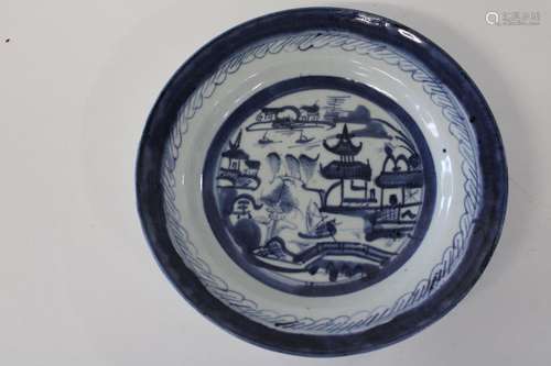 A Chinese flow blue bowl. Sold as seen d22cm