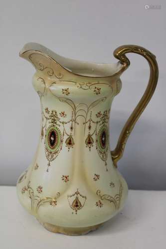 A large Crown Devon jug (Hairline crack)