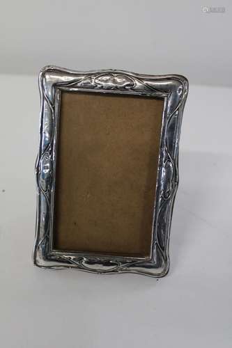 An Art Nouveau period hallmarked silver photo frame 17x12cm