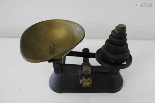 A set of vintage kitchen scales & weights