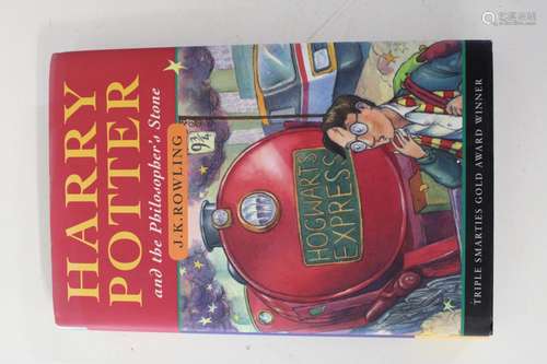 A signed copy by J K Rowling of Harry Potter & the Philosoph...