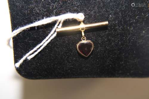 A 9ct gold & garnet T-Bar pendant