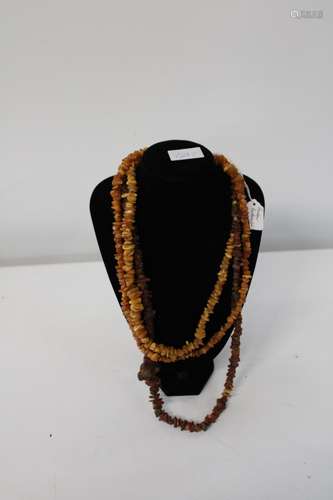 Three raw amber necklaces (two butterscotch & one cognac)