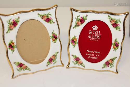 Two smaller Royal Albert OCR photo frames