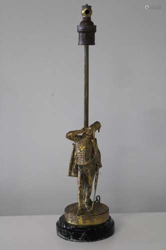 A gilt metal soldier figural lamp h35cm