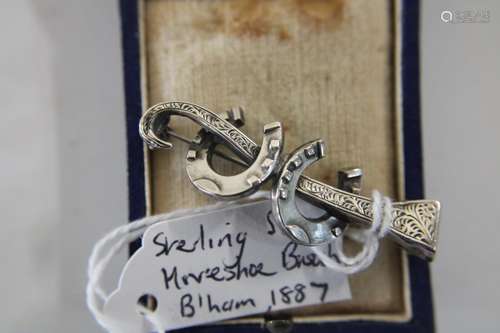 A hallmarked Victorian silver lucky horse shoe brooch