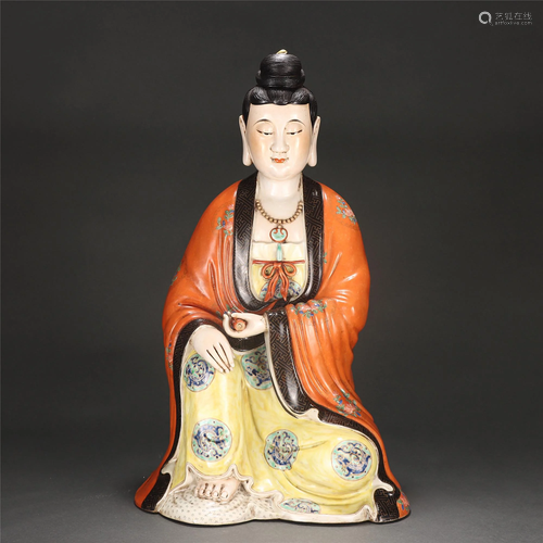 A CHINESE FAMILLE ROSE GUANYIN STATUETTE