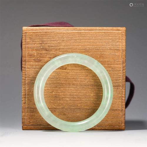 A CHINESE JADEITE BANGLE