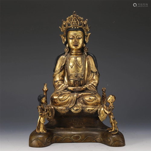 A CHINESE GILT BRONZE GUANYIN AND ACOLYTES