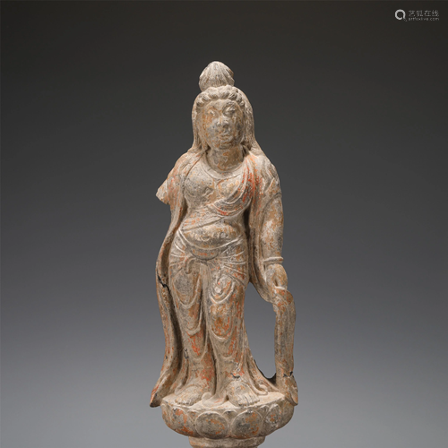 A CHINESE CARVED STONE STANDING BODHISATTVA