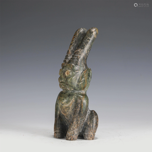 A JADE CARVING OF HUMANOID