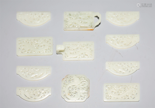 A SET OF RETICULATED WHITE JADE BELT PLAQUES