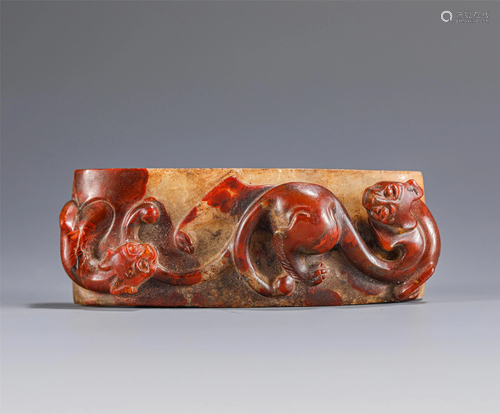 A CHINESE CARVED DOUBLE BEASTS JADE DECORATION