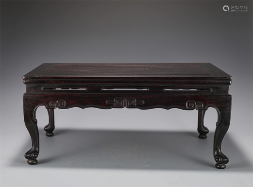 A CHINESE CARVED ROSEWOOD LOW TABLE