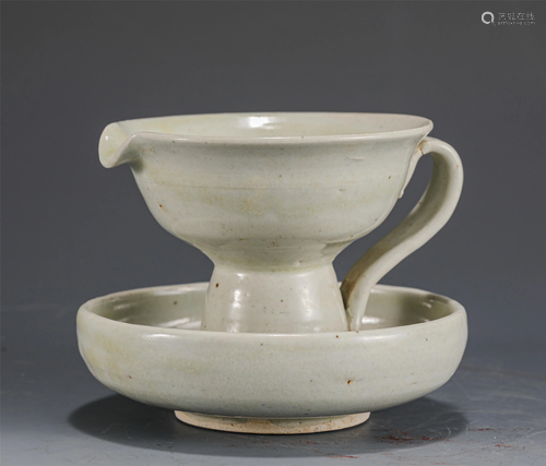 A CHINESE WHITE GLAZE OIL LAMP CUP AND SAUCER