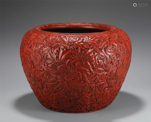 A CHINESE CARVED CINNABAR LACQUER PEONY VASE