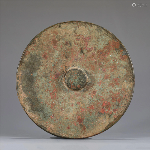 A CHINESE BRONZE MIRROR