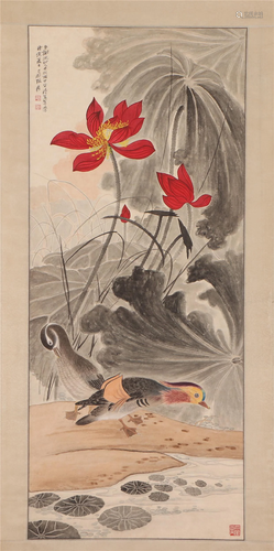 A CHINESE PAINTING OF MANDARIN DUCKS AND RED LOTUS