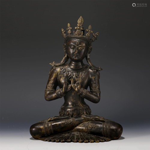 A TIBETAN BRONZE GILT FIGURE OF VAIROCANA