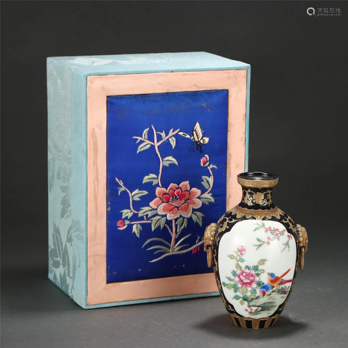 A CHINESE BLACK GROUND FAMILLE ROSE VASE