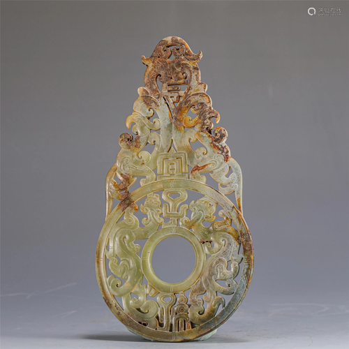 A CHINESE HOLLOW CARVED JADE BI