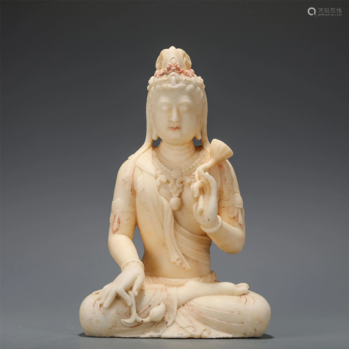 A CHINESE CARVED MARBLE GUANYIN STATUETTE