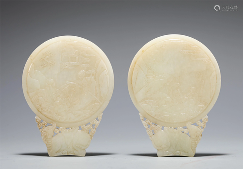 PAIR CARVED WHITE JADE FIGURAL PLAQUES