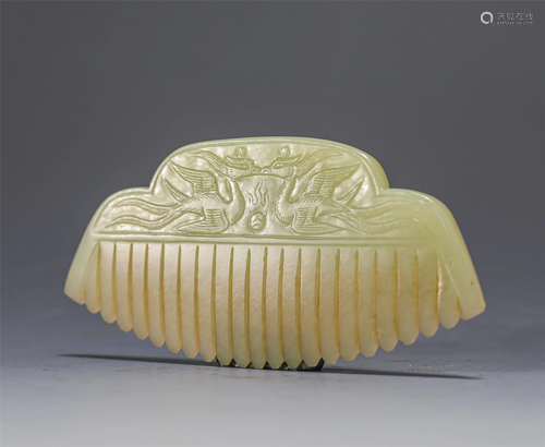 A CHINESE CARVED DOUBLE PHOENIXES JADE COMB