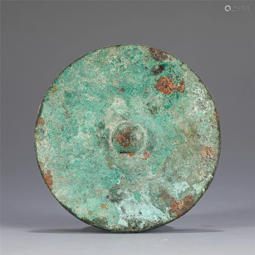 A CHINESE BRONZE MIRROR