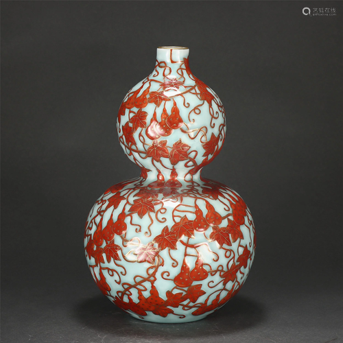 A CHINESE GOLD PAINTED IRON-RED DOUBLE-GOURDS VASE