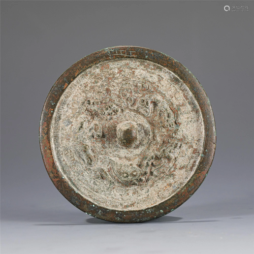 A CHINESE BRONZE MIRROR