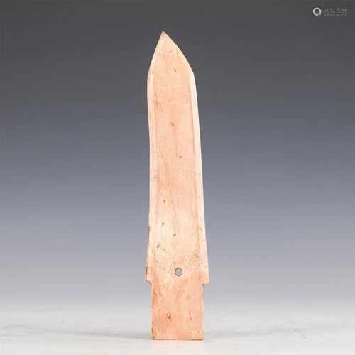 A CARVED CHICKEN BONE JADE DAGGER-AXE