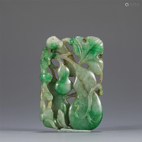 A CHINESE CARVED JADEITE DOUBLE-GOURDS PENDANT