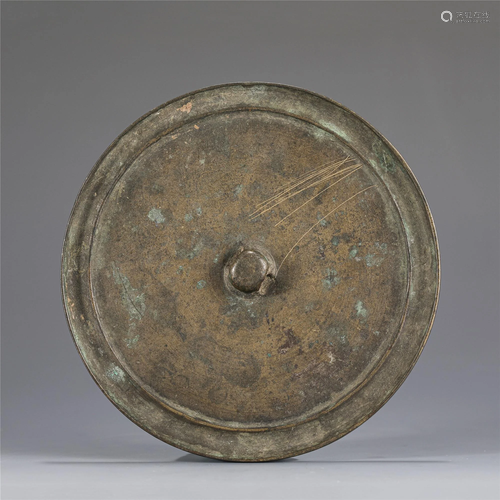 A CHINESE BRONZE MIRROR