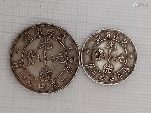 TWO CHINESE OLD SILVER COINS