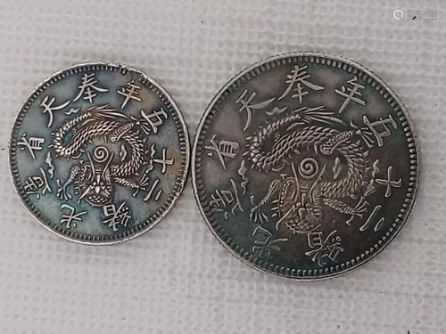 TWO CHINESE OLD SILVER COINS