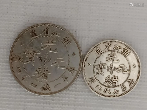 TWO CHINESE OLD SILVER COINS