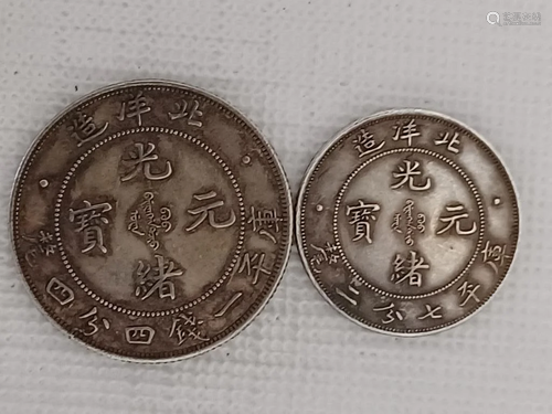 TWO CHINESE OLD SILVER COINS