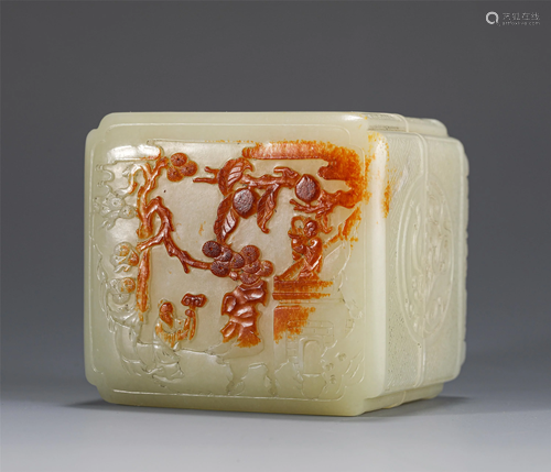 A CHINESE CARVED WHITE AND RUSSET JADE BOX AND COVER