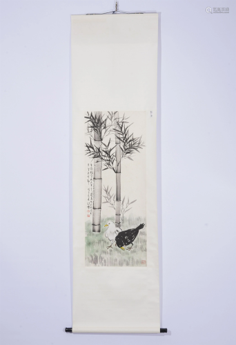 A CHINESE PAINTING OF BIRDS AND BAMBOOS