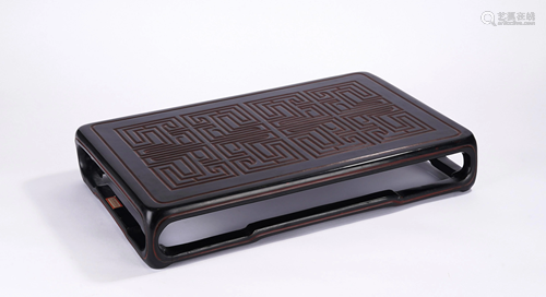 A CHINESE CARVED LACQUER RECTANGULAR LOW TABLE