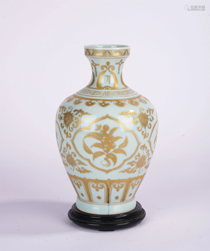 A CHIESE PALE BLUE GLAZE AND GILT VASE