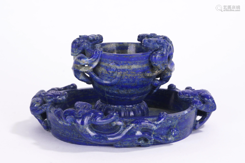 A CARVED LAPIS LAZULI CHI-DRAGONS STEM CUP AND SAUCER