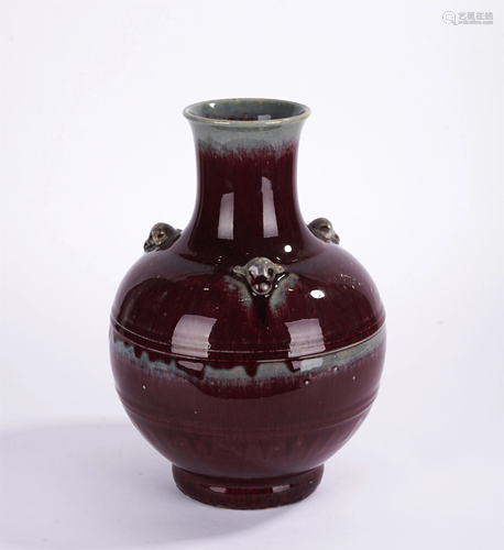 A CHINESE FLAMBE GLAZE GOAT-HEADS VASE