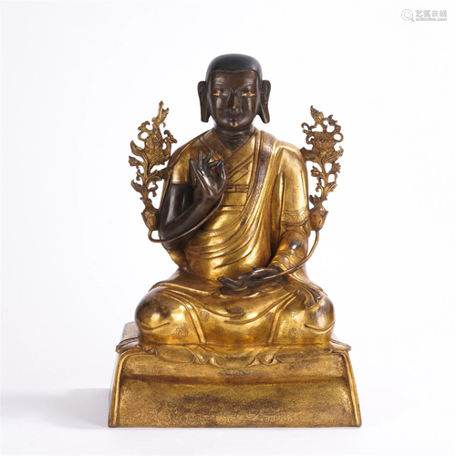 A GILT BRONZE FIGURE OF TSONG KHAPA