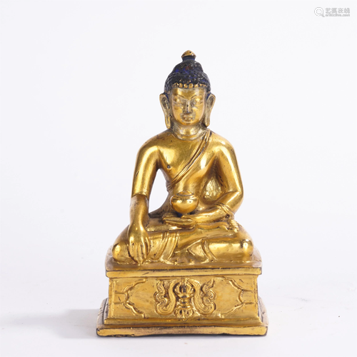 A GILT-BRONZE FIGURE OF BHAIYAJYAGURU