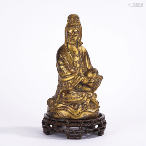 A CHINESE GOLD PAINTED WOODEN BUDDHA STATUETTE