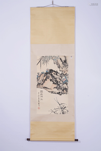 A CHINESE PAINTING OF FLOWERS AND ROCK